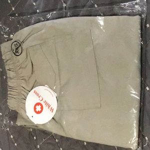 white cross khaki scrub pants XXS new with tags  in Women